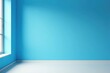 © vattana - Empty room with a bright blue wall and a window, ready for design and decoration.  A minimalist interior scene showcasing a blank space for creative expression and potential home improvements.