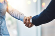 © peopleimages.com - Business people, handshake and deal with partnership in office for meeting, contract and b2b opportunity. Agreement, job promotion and teamwork with employee shaking hands for welcome and greeting