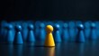 © mike - Yellow Figurine Standing Out Against Blurry Blue Crowd, Symbolizing Individuality, Leadership, and Unique Presence
