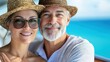 © artchvit - Retirement planning finance advisors guide. Couple enjoying their vacation with happy smiles by the ocean.