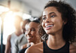 © peopleimages.com - Personal trainer, happy and woman with friends in gym for fitness, exercise and training in sports club. Laughing, athlete and men and women for wellness, health and workout class for motivation
