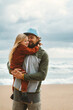 © EVERST - Parent love father and daughter child hugging walking on the beach happy family lifestyle dad and kid outdoor traveling together on summer vacations, Father's day holiday candid emotions