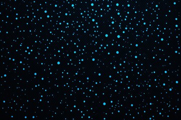 a close up of a black background with blue dots