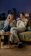 © kinomaster - Cozy evening conversation with hot drinks