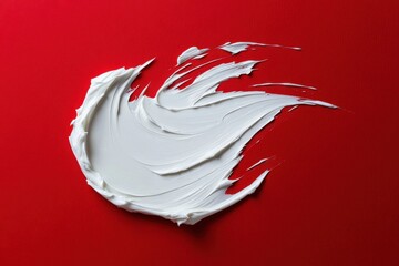Poster - Whipped cream art on a vibrant red background showcasing smooth, flowing texture