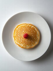 Aufkleber - Delicate golden pancake topped with a fresh raspberry on a white plate in soft natural light. Generative AI