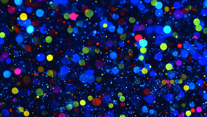 Wall Mural - abstract, colorful bokeh lights background. shiny and glowing dots on a dark blue backdrop.