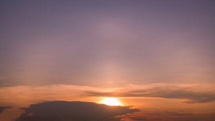 Wall Mural - panoramic view of sunset golden and blue sky nature background. colorful dramatic sky with cloud at 