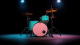 Turquoise drum kit on stage with cymbals and lighting, against a dark background