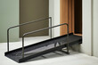 © lina - modern black metal ramp with mesh surface providing accessibility