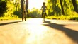 © Lion - An abstract composition of a bike shadow on a paved path, with a blurred father and child riding in the background