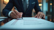 © Augusto - Businessman Confidently Marks Checklist Box With His Ballpoint Pen