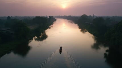 Wall Mural - A tranquil river at sunset with a lone boat gliding through calm waters.