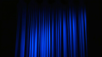 Canvas Print - blue velvet curtain covering a stage in the dark