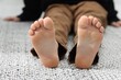© New Africa - Little boy on soft carpet indoors, closeup
