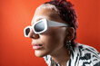 © ADDICTIVE STOCK - Fashion model with animal print outfit and bold white sunglasses