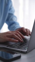 Businessman typing on a computer keyboard.
A man works at a laptop.
A programmer works at a computer.
Office worker.
Keyboard, laptop, work, office