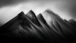 © Igor - Mountain range and top with clouds in B&W