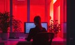 © SanyBRZ - In this image, a female professional is pictured working late in a contemporary office space bathed in dramatic red lighting