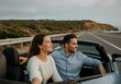 © Rizka - Happy couple in convertible on highway