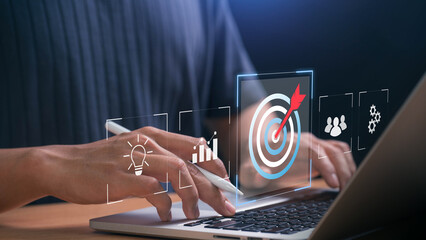 Aufkleber - Business goal setting and digital strategy. professional working on a laptop with goal achievement icon, business analytics, teamwork, and innovation, symbolizing success and strategic planning.