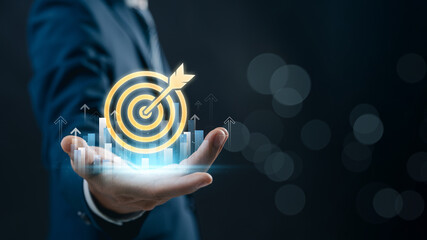 Poster - Business goal setting and success strategy. businessman with glowing target with with financial growth indicators, emphasizing leadership, data-driven decision making, and success.