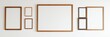 © Chalermrach - Empty picture frames in various sizes and orientations creating a family photo gallery on a white wall mockup template, moment, white wall