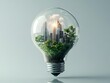 © Ardhana - A green city is inside a light bulb on a white surface