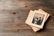© Сергей Захаров - faded vintage photograph lies on rustic wooden table its edges slightly curled with age evoking nostalgia