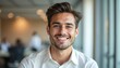 © Vadym - Smiling young bearded man portrait in office. Guy in white shirt, open posture shows positive attitude. Modern business concept photo, cheerful expression, happiness, success for CV, apply, student