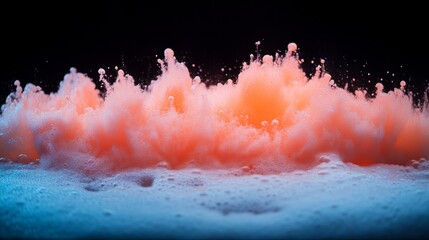 Poster - Close-up of vivid pink and blue powder bursting against a black background, forming energetic splashes and allowing room for creative text on the right side