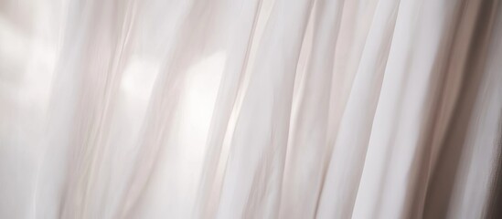 Leinwandbilder - Soft flowing cream fabric draping elegantly on a white background creates a serene atmosphere perfect for showcasing relaxation and comfort themes