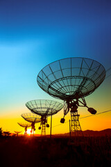 Wall Mural - the silhouette of a radio telescope observatory
