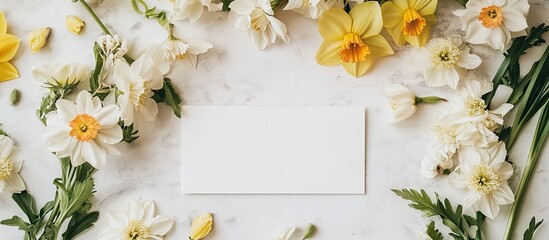 Aufkleber - Bright spring floral arrangement with white and yellow daisies, accents of green foliage surrounding a blank card centered on a light background.