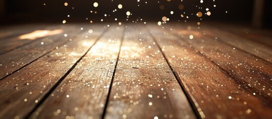 Leinwandbilder - Sparkling fairy dust glimmers in warm golden tones across a wooden floor creating a magical glow with scattered light reflections and enchanting ambiance