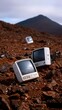 © Aofintarapak - Discarded Television Sets Populate a Barren Landscape Under a Cloudy Sky with a Distant Peak