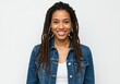 © Alper AI - A woman with long, thin dark brown dreadlocks, wearing a denim jacket and white shirt, smiling and looking directly at the camera, against a plain white background.