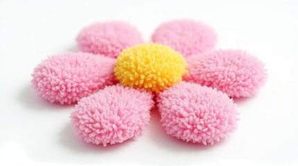 Poster - A pink and yellow flower made of yarn