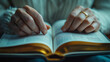 © MagicsPhotos - A close-up of elegant hands flipping through a high-end book