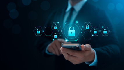 Wall Mural - cyber ​​security and internet data protection, businessman using smartphone with padlock icon encryp