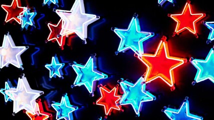 Aufkleber - Colorful neon stars in red, blue, and white on black background. Retro signage concept