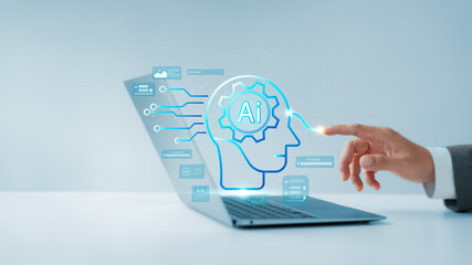 AI Agent and Assistant Young man uses AI Agent on laptop to help maximize efficiency and manage important things in life, Artificial intelligence and AI are being used to enhance human potential.