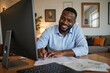 © NeedMoreMars - Smiling African American Male Professional Working from Home in Light Blue Shirt Engaging with Computer Screen at Minimalist Desk, Demonstrating Remote Work Lifestyle