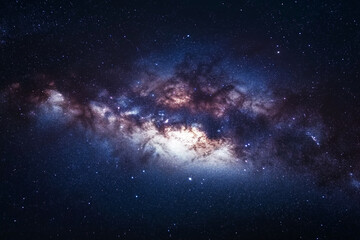 vast, star-filled sky with a large, glowing cloud of gas and dust. The stars are scattered throughout the sky, with some closer together and others more spread out