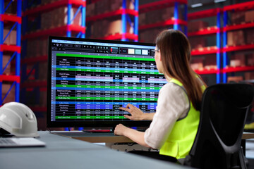 Poster - Female Warehouse Manager Using Inventory Software