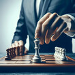 © unairakstudio - Close-up shot of a man's hand on a chessboard, conveying the idea of skill, precision, and intellectual engagement.