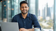 © PRASANNAPIX - young indian man working on laptop