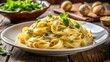 © Sirinporn - Panoramic Gourmet Tagliatelle with Rich Truffle Cream Sauce
