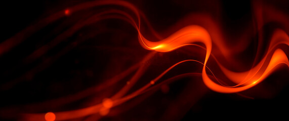 Leinwandbilder - Abstract orange light trails flowing on dark background