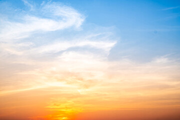 Wall Mural - beautiful , luxury soft gradient orange gold clouds and sunlight on the blue sky perfect for the bac